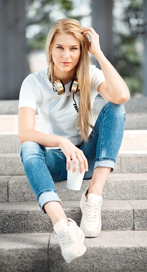 cute woman sitting on steps